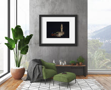 Load image into Gallery viewer, Palazzo Vecchio at Night, a pastel drawing on black paper inspired by the City Hall architecture in Florence, Italy, shown here in mockup gray frame with wide white mat.  Loft apartment living room art by Kelly Borsheim
