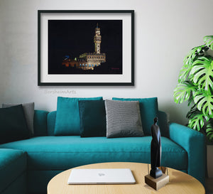 Palazzo Vecchio at Night, a pastel drawing on black paper inspired by the City Hall architecture in Florence, Italy, shown as living room wall art with a teal couch.  Sculpture in wood by Vasily Fedorouk.