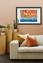 Load image into Gallery viewer, Here is another example of how you could frame this colorful pastel artwork on Italian paper.  White mat with a thin, classic simple black frame looks great in this warm-colored living room scene.  
