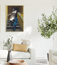 Load image into Gallery viewer, The warm Tuscan colors in a stairwell in Florence, Italy, help this figurative artwork look great in a room of clean neutrals, olive tree branches and golden couch pillows.
