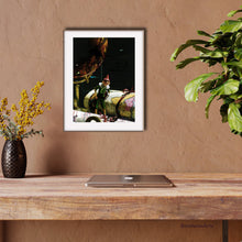 Cargar imagen en el visor de la galería, Smaller print shown framed on the wall of a home office.  Lovely warm colors work well together.  Pinocchio as World Traveler
