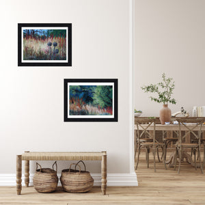 Showing both Ligurian landscape paintings hung framed and matted on an entryway wall.