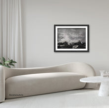 Load image into Gallery viewer, Another example image of how you could frame the original drawing Splash for a modern, minimalist neutral white or creme living room scene with a long elegant slow curving couch.
