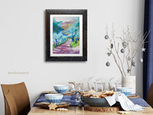 Cargar imagen en el visor de la galería, Tuscan Road in Shadows Pastel Art shown here in mockup frame in dining room with blue decor.  turquoise is the main color in the artwork
