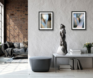 This nude female stone sculpture makes a great look with photographs of the silver architecture of the Bilbao Museum in Spain.  Living room decor at its finest!