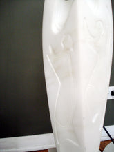 Cargar imagen en el visor de la galería, Bas relief detail in this marble flame sculpture... can you see the figure?  like primitive art, only modern art, contemporary sculpture
