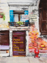 Load image into Gallery viewer, The words will not appear on this original work of art using pastel pigments on sanded paper.  Capturing a charming scene of a Venetian home, with old wooden doors, and a balcony sporting teal shutters.  Small carpets hang from the clothesline that crosses the window behind the balcony.  A red fire hydrant is in the lower right corner, beneath the brick wall.
