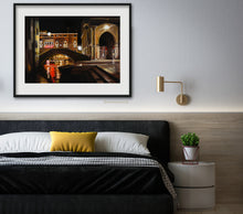 Load image into Gallery viewer, original oil painting Venezia Fish Market at Night by K. Borsheim shown here in mockup of contemporary bedroom scene in which peaceful, restful night art noctural art will aid sleep and fun dreams of exotic places
