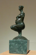 Pregnancy, a female pregnant mamma squatting with legs together in a graceful, elegant pose, bronze figure statue, mounted on a green marble base, tabletop sculpture by Vasily Fedorouk, Ukrainian - American sculptor artist