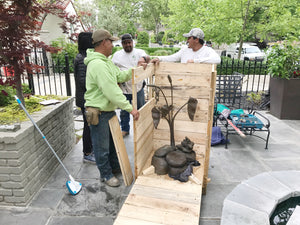 Showing the unpacking of the garden-size sculpture .  The bronze was crated and secured in place inside the wooden box. for secure shippiment by air from Italy to California.