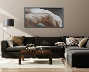 Arch, at 24 inches high x 48 inches wide, framed beautifully in a beveled slate grey frame, brings this wide brown couch together in the neutral living room.  Also featuring Zebra Lips, a carving in marble in zebra marble from Utah, a sculpture resting on the coffee table.  Buy from a living artist!