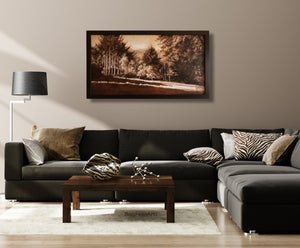 monochromatic brown landscape painting in living room with dark grey couch and wooden coffee table... art for the home