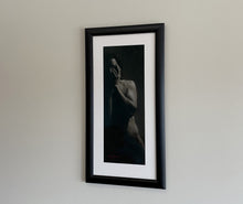 Load image into Gallery viewer, Charcoal drawing titled Enough!  shown here in its white mat with medium wide black frame and Museum Glass, for much lower reflections.  Charcoal and white pastel on grey Roma paper, fine art original drawing of male nude with his hands over his face.  Dramatic light and shadows.
