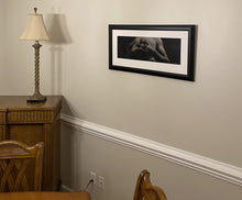 Load image into Gallery viewer, Add elegance to any room with Entwined, framed charcoal drawing of man with interlaced fingers, as it might look in a dining room as home decor art
