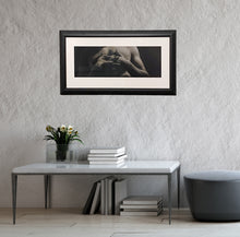 Load image into Gallery viewer, Entwined, framed charcoal drawing of man with interlaced fingers, as it might look in a home
