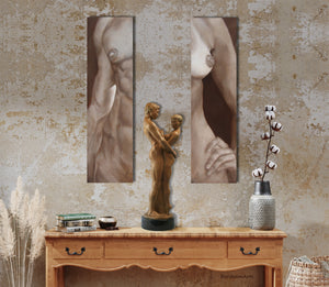 Neutral art decor, couple art bronze Together and Alone is displayed on a lovely wooden sideboard table, situated between the nude torso paintings Lui and Lei