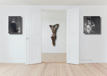 Charger l&#39;image dans la galerie, Great entryway duo paintings Luminosity, her and him meditating on candlelight, shown here with the large bronze Ten as a centerpiece inside the welcoming doors in this elegant home with white walls and light wood floors
