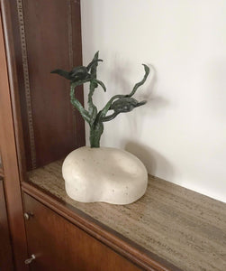 This niche in a wall-shelf unit to house a television gives a place to exhibit in the living room the 16 inch tall sculpture of Sea Turtles swimming in kelp. Sculpture is a limited edition bronze and stone (each limestone base is hand carved). 3-d Art by Kelly Borsheim