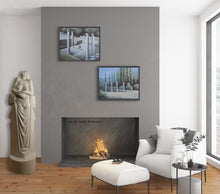 Laden Sie das Bild in den Galerie-Viewer, Marble sculpture Birth of Beauty Venus looks great in this living room scene with fireplace.  Two of the same artist Vasily Fedorouk landscape paintings are framed high over the fireplace.  They depict Greek columns as a nod to Greek history and mythology.

