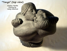 Load image into Gallery viewer, nibble nibble Tango a 2-foot tall stone carving in Alaskan marble of a closely dancing couple.  As he embraces her, she nibbles on his ear.  The figures are modern, abstracted or better, designed with minalist features and intertwined fingers.  A romantic sculpture, carved by Ukrainian-American artist and sculptor Vasily Fedorouk.  Vertical, standing figures.
