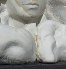 Cargar imagen en el visor de la galería, Detail of the crack in the marble that separates the hair forms where they meet.  Serenity marble portrait of a woman by Kelly Borsheim
