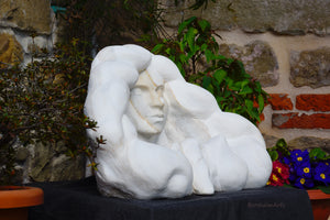 view from left Serenity Marble sculpture portrait of a serene woman with flowing locks of wavy hair marble art