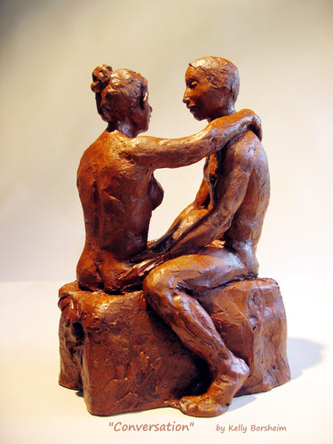 Conversation, a ceramic sculpture of a man and woman having a heart to heart discussion. Great romantic gift of original art