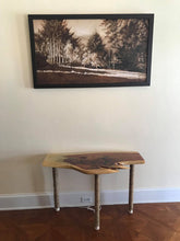 Load image into Gallery viewer, Monochromatic landscape oil painting looks great in this mostly warm neutral room decor. Shown with wood table made by another artist.
