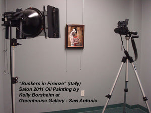 Greenhouse Gallery photographs Award-winning painting Buskers in Firenze for their art Catalog, this photo shows their setup in the art gallery to photograph artworks
