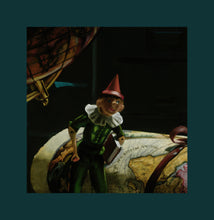 Load image into Gallery viewer, Detail of Pinocchio with old map and globe pastel art on black paper
