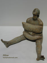 Load image into Gallery viewer, &quot;Pillow&quot; This is a great example of my late friend and mentor Vasily&#39;s voice in his art.  He often depicted people looking towards the heavens.  He was very spiritual in that way, and yet playful in his compositions.  This very affordable ceramic figure squeezes a pillow while looking up.  What do you imagine she is asking?
