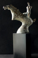 bronze sculpture of a man on a horse that is rearing or running.  A rare bronze sculpture available from the family of the late sculptor Vasily Fedorouk.