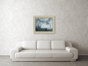 example of a framed print hung over a white couch.  Tasmania in the Clouds, landscape painting of trees in Southern Australia