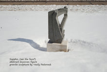Load image into Gallery viewer, Sappho is an abstracted sculpture in granite and steel of a musician (see the face?).  Granite is a perfect material for outdoor garden sculpture, shown here in the snow in Chicago area, known for extreme weather.
