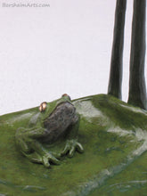 Load image into Gallery viewer, Detail of sitting frog looking up tabletop aquatic bronze sculpture, Cattails and Frog Legs Lily Pad Green Art
