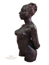 Load image into Gallery viewer, terra-cotta sculpture of a black woman with her hair pulled back into a large bun.  She stands tall and proud, her posture is slightly arched back with her arms folded together behind her, a beautiful physique
