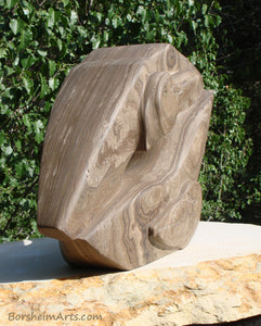 Side view of layers in Marble Pelican Lips Marble Sculpture like Petrified Wood