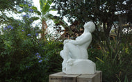 Stargazer Garden Marble Sculpture of seated Woman resting hands on a knee while leaning back to look up to the skies and stars.