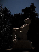 Load image into Gallery viewer, Moonlit Stargazer Garden Marble Sculpture of seated Woman resting hands on a knee while leaning back to look up to the skies and stars.
