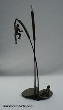 Laden Sie das Bild in den Galerie-Viewer, Whole view of tabletop sculpture statues of two men with lily pad and two cattails.  Life is so uncertain!  Thanks Lyle Lovett for those words. Artist Kelly Borsheim bronze art

