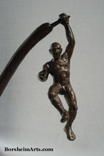 Cargar imagen en el visor de la galería, Nude man swings precariously in this bronze sculpture about choices and decisions.  Will he fall or save himself in this situation?
