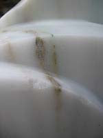 Load image into Gallery viewer, Gold veins in White Yule Marble Yin Yang Erotic Sculpture Detail
