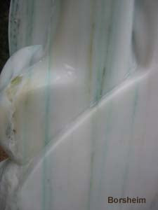 Green and gold veins in White Yule Marble Yin Yang Erotic Sculpture Detail